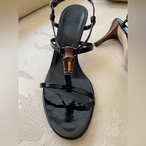 Gucci shoes size 9 with 3 inch heels in patent black leather.